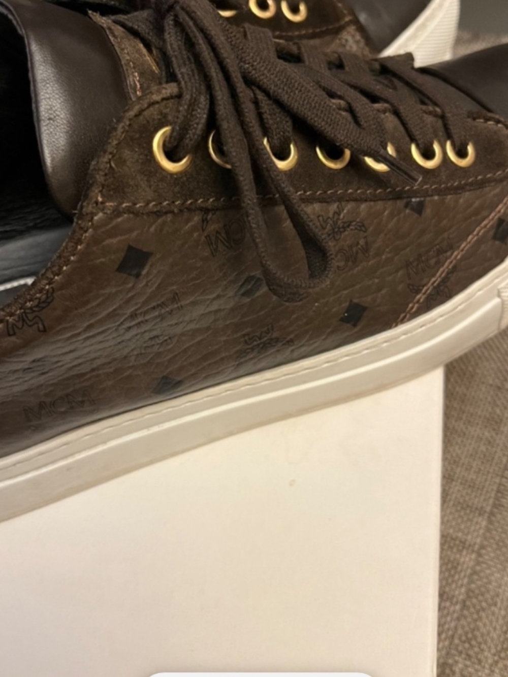 MCM means black nomad 111 low size 43 US 10